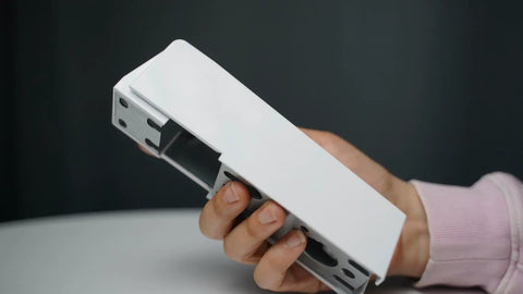 Hand holding Heavy Duty Chest Freezer Door Hinge With Spring And Cover Replacement Part For Top Opening Freezers Built Tough