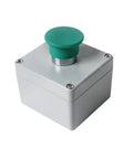 Cast aluminum push-button control box with green mushroom button on a gray square enclosure