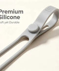 Heavy Duty Reusable Silicone Cable Ties Sort Your Wire Mess Like A Boss Handle Data Cables Zero Sweat Always Keep Your Workspace Crisp With This Flexible Tear Proof 20 Pack Organizer Kit gray silicone cable tie close-up showing durable design.