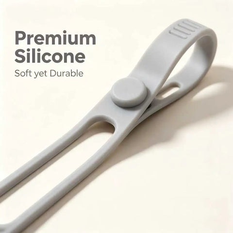 Heavy Duty Reusable Silicone Cable Ties Sort Your Wire Mess Like A Boss Handle Data Cables Zero Sweat Always Keep Your Workspace Crisp With This Flexible Tear Proof 20 Pack Organizer Kit gray silicone cable tie close-up showing durable design.