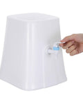 Hand operating spout on compact desktop water dispenser fits 1.2 to 5 gallon bottles ideal for desk dorm room office use