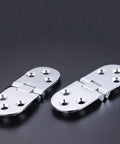 Bright Zinc Alloy Dining Table Flap Hinge For Folding Tables And Concealed Semi Circular Hinge Beefy Cabinet And Closet Folding Door Hardware Easy Install Stable Support Keeps Balance When Folding. Shiny zinc alloy hinges on black background.