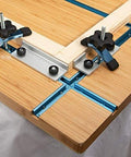 Six 48-Inch Universal T-Track Bars With Double-Cut Profile And Four 3-Inch T-Track Intersection Kits installed on a workbench
