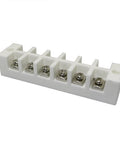 Side view of white six-position ceramic terminal block with screw terminals.