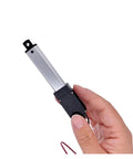 Compact 50mm DC 12V Micro Electric Linear Actuator Featuring Hella Smooth Push Rod Action and Plug And Play Motor Controller held in hand.