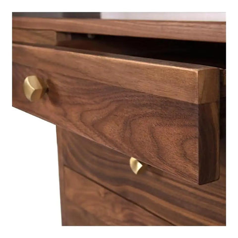 Close-up of the drawer with brass handle on Ergonomic Adjustable Standing Desk Featuring Rich Walnut Desktop Four Deep Storage Drawers Integrated Monitor Stand.