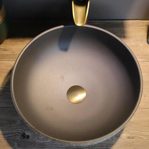 USZWBY Vessel Sinks Wash Basin Ceramic Art Table Retro Wash Basin Bathroom Wash Basin Round Home Bathroom Sink Bathroom Bowl Sink top view of sleek black ceramic basin with gold drain