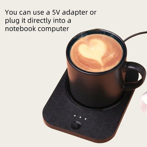Solidly Built Wireless Charging Mug Warmer And Desk Phone Base With Auto Shut Off Keeps Your Morning Brew Piping Hot While You Charge On The Fly In Classic Black with heart-shaped latte art