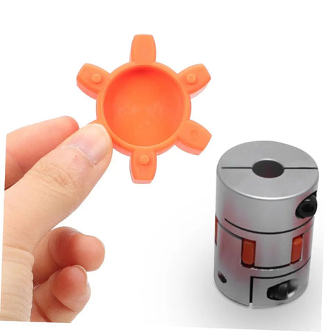 Flexible Rubber Spider Insert For Plum Couplings 40mm Outer Diameter held near heavy-duty jaw coupling pad.