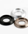 100-Piece Set of Badass M6 Titanium Gray Aluminum Grooved Washers featuring a sick metallic glow in black, silver, and bronze.