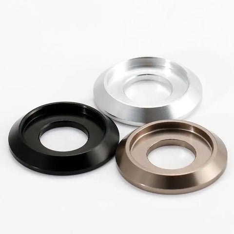 100-Piece Set of Badass M6 Titanium Gray Aluminum Grooved Washers featuring a sick metallic glow in black, silver, and bronze.