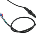 Close-up of wires and connectors for 12V DC 4-Wire Remote Switch For Hydraulic Dump Trailer Dual-Acting Pump, black cable coiled.