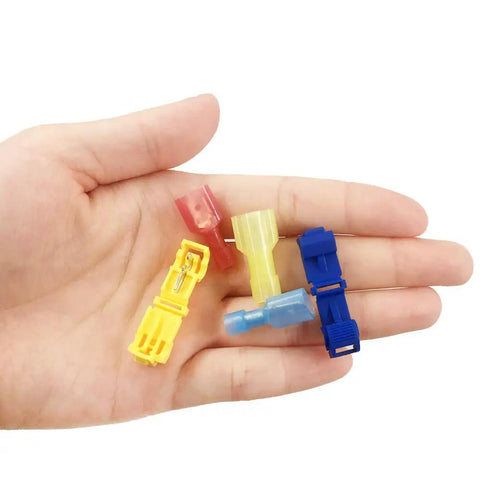 Hand holding T Tap Wire Connectors Kit 60 Pieces 30 Pairs Self Stripping Plug And Play Ready Quick Wire Splice Taps