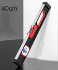 High Precision Aluminum Alloy Level with Exposed Magnets, 40cm level resting against a wall with visible magnetic attachment.