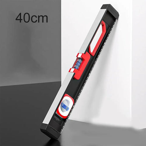High Precision Aluminum Alloy Level with Exposed Magnets, 40cm level resting against a wall with visible magnetic attachment.
