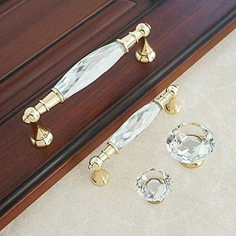 Crystal Drawer Pulls 2 Pack Glass And Zinc Alloy Cabinet Handles with Gold Finish, display on a wooden surface