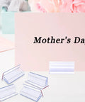 Six Pack Heavy Duty Self Adhesive Sneeze Guard Holders With Secure Locking Design For Quarter Inch Clear Acrylic Sheets displayed with a Mother's Day sign.