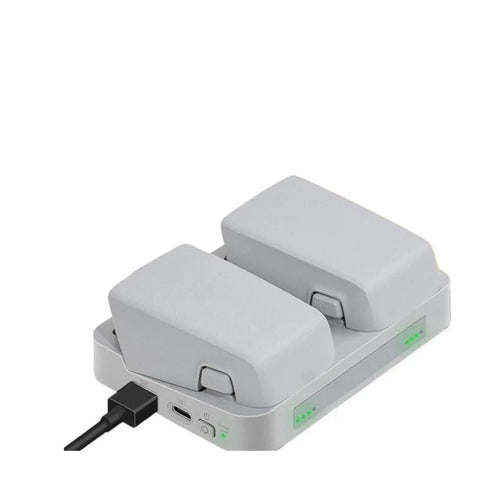 Flip Drone Dual Battery Charging Hub 2-Way Power Bank Charger Station for drone accessories, showing secure battery connections.