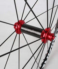 Close-up of Road Bike Wheelset 700C Double Walled Alloy Rims With Carbon Drum Hub V Brake Quick Release