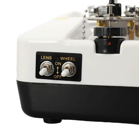 Close-up of Tough As Nails Automatic Optical Lens Groover And Beveling Machine controls with lens and wheel switches.