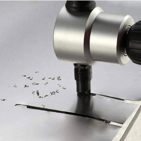 Close-up of Double Headed Sheet Metal Nibbler Cutter with Adjustable 360 Degree Heads cutting metal sheet, demonstrates curved cut capability.
