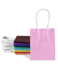 Mini Gift Bags With Handles Dope Bulk Set Of 24 In 24 Colors 4.5 By 2.5 By 6 Inches For Party Favors And Small Gifts Made From Recycled Kraft Paper Eco Friendly Durable For Craft Projects Great Value, pink bag with multiple colors behind.