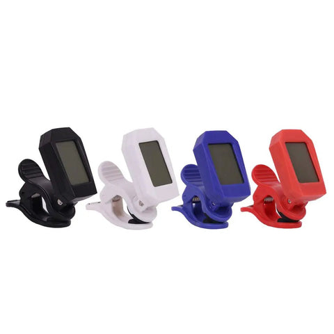 Four colorful electronic clip-on digital tuners in black, white, blue, and red for precise tuning.