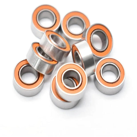 Group of ceramic S688 RS CB ABEC7 ball bearings, 8x16x5 mm, with orange seals.