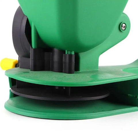 Close-up of All Purpose Handheld Grass Seed Spreader for Lawn Care with adjustable settings for year-round use.