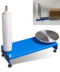 Heavy Duty Manual Pallet Stretch Wrap Machine With Quick Film Dispenser And 30 Cm Rotating Turntable on a blue base.