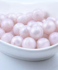 Smooth Premium Silicone Beads For Keychain Making And Jewelry Crafting Assorted Sizes in pale pink color.