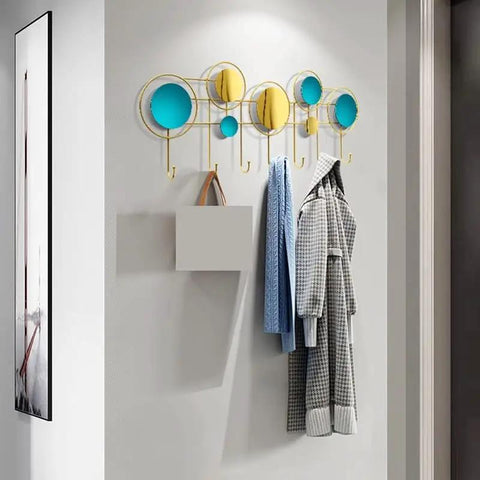 Built Different Wall Mounted Coat Hooks For Entryway with gold and blue circles holding coats and bags, stylish and space-saving.