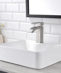 White Rectangle Ceramic Bathroom Vessel Sink And Brushed Nickel Waterfall Faucet Combo, 16x12 Inch Art Basin in a Luxe Vanity Setting