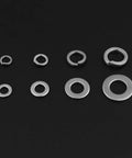 200 Piece Stainless Steel Flat And Spring Washer Set With Box For M5 M6 M8 M10 arranged on a black surface