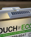 Solar Dual Sided LED Post Light illuminates sign for real estate, ultra bright and weather resistant, with mounting bracket.