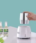 Portable Car Cup Beverage Cooler With Electric Adapter And 350ML Mug 24 Hour Semiconductor Fridge with silver mug and ginger drinks.