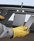 Hands adjusting clamps on MB48B 48 Inch Pan Style Mini Brake For Portable On The Job Pans And Large Components 135 Degree Bends
