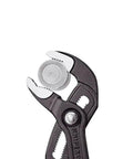 Close-up of Heavy Duty 22 And A Half Inch Cobra Style Water Pump Pliers And Pipe Wrench with box joint holding nut.