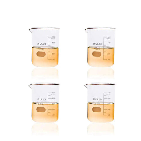 Set of four 500ml beakers with printed graduations filled with liquid, 3.3 borosilicate glass, Griffin low form, ASTM E960 ready, lab work