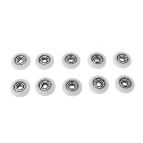 Buttery Smooth 10 Pcs Nylon Pulley Rolling Bearing Wheels For Furniture Drawer And Sliding Door Runner Hardware in white.
