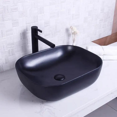 USZWBY Vessel Sinks Bathroom Sink Washbasin Art Basin Ceramic Black Square Sink with modern faucet on marble countertop.
