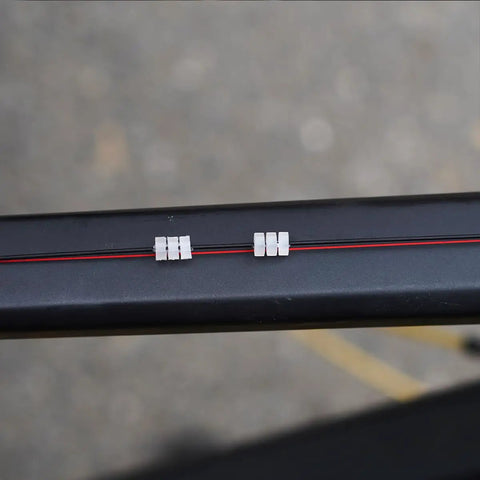 Close-up of Shifter Cable Set With Braided Housing And Teflon Coated Inner Wire For Road And Mountain Bike Derailleurs