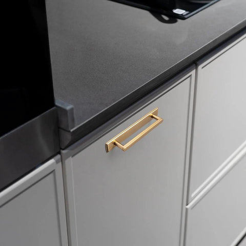2 Pack 5 Inch Center To Center Champagne Bronze Cabinet Handles With Backplates installed on modern kitchen drawer