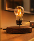 Levitating Bulb Lamp With Magnetic Floating Light for home office desk decor, bulb hovering above wooden base