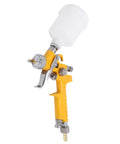 Rock Solid And Compact 125Ml Mini Spray Gun With Easy Turn Triple Knobs for Hella Smooth Paint Jobs on Cars Furniture and Walls Featuring a Precise 1Mm Nozzle Tip in yellow with clear cup.