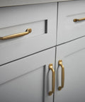 Set Of Six Traditional Five Inch Center To Center Antique Brass Cabinet Pulls With Curved Classic Design for vintage kitchen cabinets