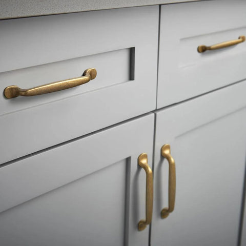 Set Of Six Traditional Five Inch Center To Center Antique Brass Cabinet Pulls With Curved Classic Design for vintage kitchen cabinets