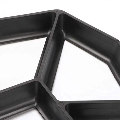 Close-up of black Two Pack Plus Size Stepping Stone Molds For Diy Concrete Pavers 16.9 By 16.9 By 1.57 Inches Reusable Walkway Molds