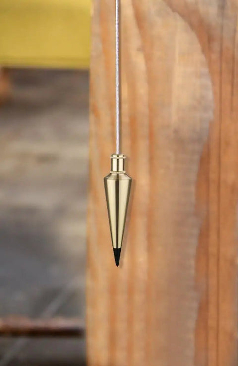 Brass Plumb Bob 0.5 Lb Weight, Gold Finish, hanging vertically for precise alignment, solid brass construction, replaceable steel tip