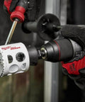 Milwaukee bi-metal hole saw, 3-3/4 in, attached to a drill